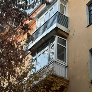 Обшивка Сайдингом снаружи  балкона 